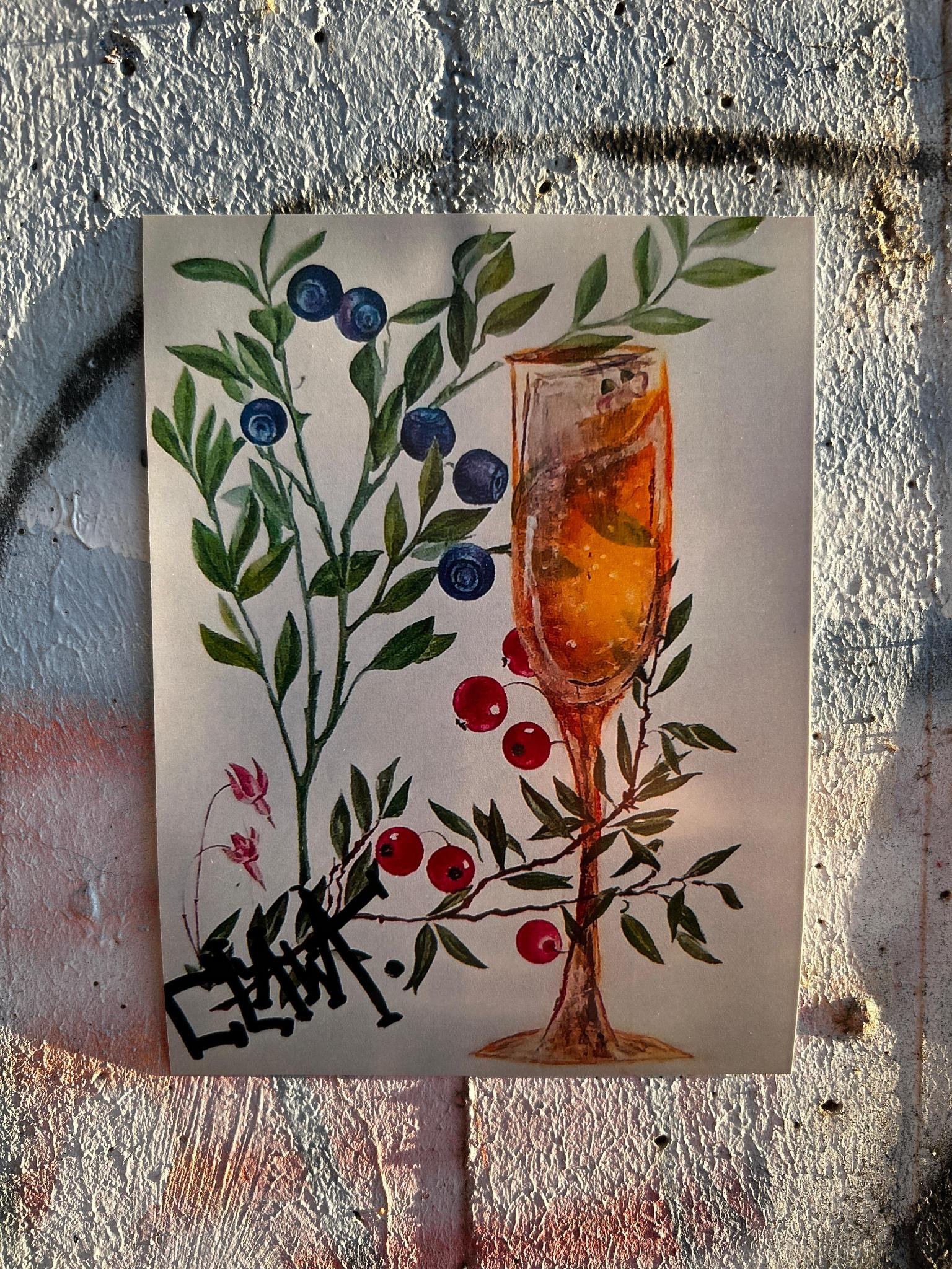 Featured artwork showing a champagne glass with blueberries and red berries